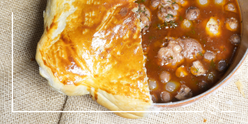 coq au vin mit blaetterteighaube